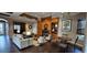 Inviting clubhouse showcasing cozy seating, a fireplace, and a convenient kitchenette at 14214 Fredricksburg Dr # 106, Orlando, FL 32837