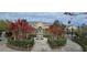 Inviting entrance with lush landscaping and elegant water fountain feature in courtyard at 14214 Fredricksburg Dr # 106, Orlando, FL 32837