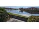 Relax by the tranquil lake with fountain feature, providing a serene escape and community ammenity at 14214 Fredricksburg Dr # 106, Orlando, FL 32837