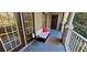 Cozy outdoor patio with comfortable seating and pleasant views at 14214 Fredricksburg Dr # 106, Orlando, FL 32837