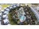 Aerial view of community and resort-style pool at 1432 Reunion Blvd, Reunion, FL 34747