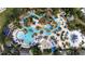 Large resort-style pool with water features at 1432 Reunion Blvd, Reunion, FL 34747