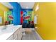 Bathroom with a shower and a fun superhero theme at 1432 Reunion Blvd, Reunion, FL 34747
