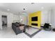 Spacious living room with fireplace, large TV and comfy seating at 1432 Reunion Blvd, Reunion, FL 34747