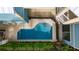 Overhead view of a refreshing, rectangular swimming pool, perfect for relaxation at 1432 Reunion Blvd, Reunion, FL 34747