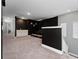 Home theater with projector, large screen and comfortable seating at 1432 Reunion Blvd, Reunion, FL 34747