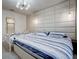 Bright bedroom with a king-size bed and an ensuite bathroom at 1836 Delrose Rd, Kissimmee, FL 34744