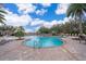 Resort-style community pool with plenty of lounge chairs at 1836 Delrose Rd, Kissimmee, FL 34744