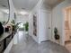 Bright and spacious entry hall with tile flooring and views to living areas at 1836 Delrose Rd, Kissimmee, FL 34744