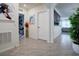 Bright hallway with tile floors and artwork at 1836 Delrose Rd, Kissimmee, FL 34744