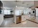 Open concept kitchen with stainless steel appliances and granite countertops at 1836 Delrose Rd, Kissimmee, FL 34744
