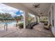 Relaxing covered patio overlooking the community pool at 1836 Delrose Rd, Kissimmee, FL 34744