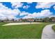 Community features a sand volleyball court and grassy area at 1836 Delrose Rd, Kissimmee, FL 34744