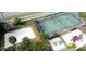 Community features an expansive tennis court, playground, and ample green space at 2035 Royal Bay Blvd # 45, Kissimmee, FL 34746