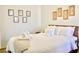 Bright bedroom with a king-size bed and plenty of natural light at 2035 Royal Bay Blvd # 45, Kissimmee, FL 34746