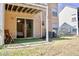 Private patio with artificial turf and sliding glass door at 2035 Royal Bay Blvd # 45, Kissimmee, FL 34746
