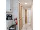 Hallway with closet and fire extinguisher at 2035 Royal Bay Blvd # 45, Kissimmee, FL 34746