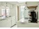 Kitchen with white cabinets, appliances, and a window at 2035 Royal Bay Blvd # 45, Kissimmee, FL 34746