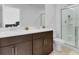 Bathroom with double vanity and shower at 2106 Crystal Bell St, Orlando, FL 32824