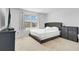 Main bedroom with large bed and dresser at 2106 Crystal Bell St, Orlando, FL 32824