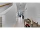Bright and airy entryway with tile flooring and view into living area at 2106 Crystal Bell St, Orlando, FL 32824