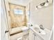 Updated bathroom with new vanity and shower at 248 Lindale St, Lakeland, FL 33809