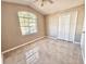 Bright bedroom with large window and spacious closet at 248 Lindale St, Lakeland, FL 33809