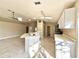 Modern kitchen with white cabinets and quartz countertops at 248 Lindale St, Lakeland, FL 33809