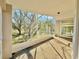 Bright screened porch with view of backyard at 248 Lindale St, Lakeland, FL 33809
