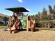 Community playground with slide and climbing structure, perfect for active play at 2559 Sedge Grass Way, Orlando, FL 32824