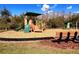 Community playground with slide and climbing structure, perfect for active play at 2559 Sedge Grass Way, Orlando, FL 32824