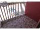 Outdoor balcony with tiled flooring and a white railing at 261 Autumn Ln # 4, Kissimmee, FL 34743
