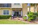 Serene backyard patio with manicured landscaping, providing a relaxing outdoor living space at 2833 Oakwater Dr # 169, Kissimmee, FL 34747