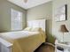 Cozy bedroom with a comfortable bed, window for natural light, and soothing wall color at 2833 Oakwater Dr # 169, Kissimmee, FL 34747