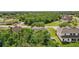 Beautiful aerial view of the house showing its expansive roof, well-manicured lawn, and green surroundings at 3209 Eagle Watch Dr, Kissimmee, FL 34746