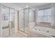 Bathroom features a shower, soaking tub and double sinks at 3209 Eagle Watch Dr, Kissimmee, FL 34746