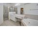 Bathroom boasts double vanity, shower, and tub at 3209 Eagle Watch Dr, Kissimmee, FL 34746