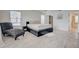 Bedroom with a chaise lounge and en-suite bath access at 3209 Eagle Watch Dr, Kissimmee, FL 34746