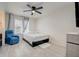 Bedroom featuring a comfy bed and a relaxing chair at 3209 Eagle Watch Dr, Kissimmee, FL 34746