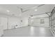 Spacious garage with ample room for vehicles, storage, and projects at 3209 Eagle Watch Dr, Kissimmee, FL 34746