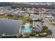 Community pool and lakefront property at 3240 Preserve Dr, Orlando, FL 32824