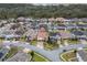 Two-story house in a neighborhood near a lake at 3240 Preserve Dr, Orlando, FL 32824