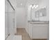 Clean bathroom with granite countertop and walk-in shower at 3240 Preserve Dr, Orlando, FL 32824