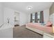 Spacious bedroom with ensuite bathroom and natural light at 3240 Preserve Dr, Orlando, FL 32824