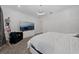 Bright bedroom with a large TV and plenty of space at 3240 Preserve Dr, Orlando, FL 32824