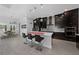 Modern kitchen with dark cabinetry and a large island at 3240 Preserve Dr, Orlando, FL 32824