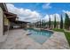 Inviting pool with a spacious deck and lounge chairs at 3240 Preserve Dr, Orlando, FL 32824