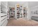 Large walk-in closet with ample shelving and drawers at 3240 Preserve Dr, Orlando, FL 32824