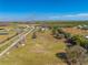 Wide shot of the property and surrounding area at 3449 N Canoe Creek Rd, Kenansville, FL 34739