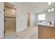 Modern bathroom with a large walk-in shower and double vanity at 3449 N Canoe Creek Rd, Kenansville, FL 34739